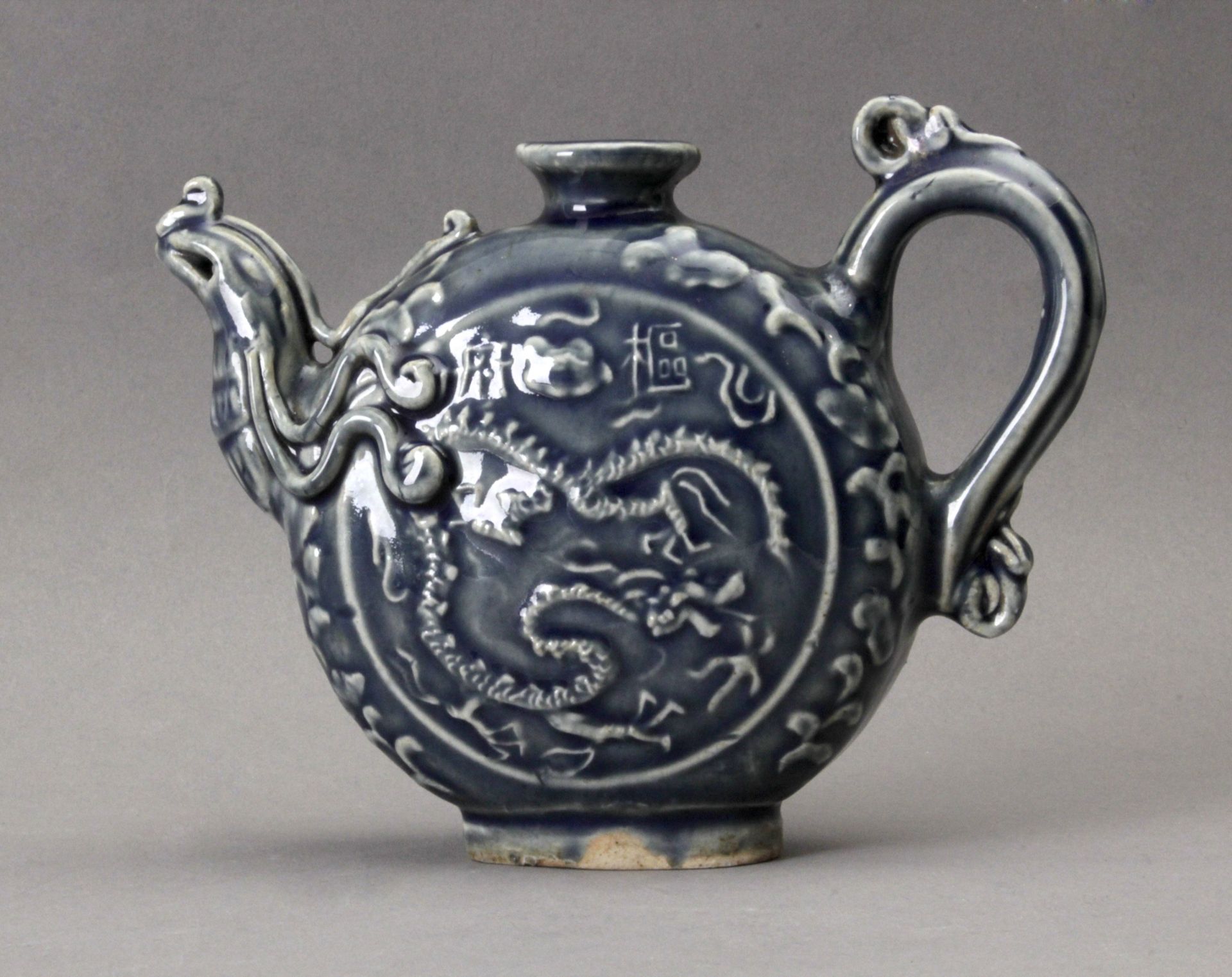 A 20th century Chinese glazed pottery wine jar