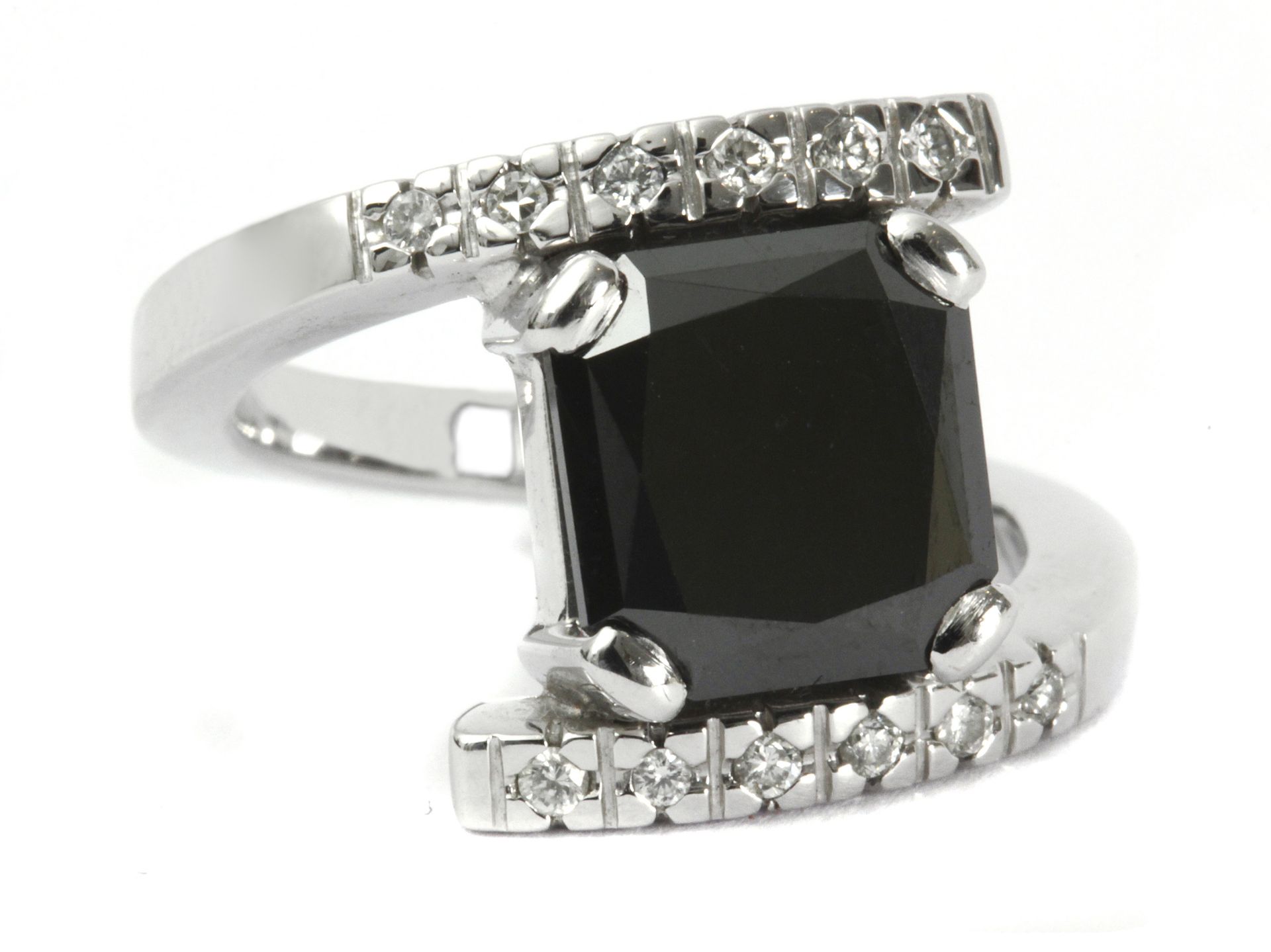 Black diamond and colourless diamonds ring with an 18k. white gold setting