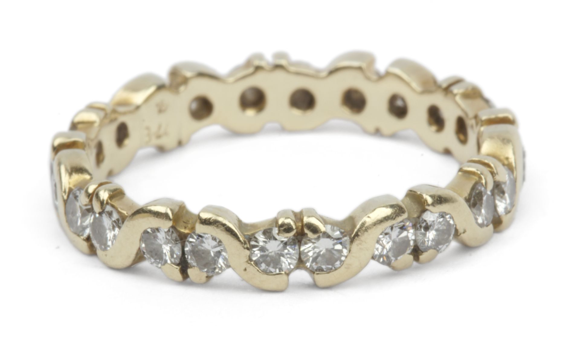 Brilliant cut diamonds half eternity ring with an 18k yellow gold setting