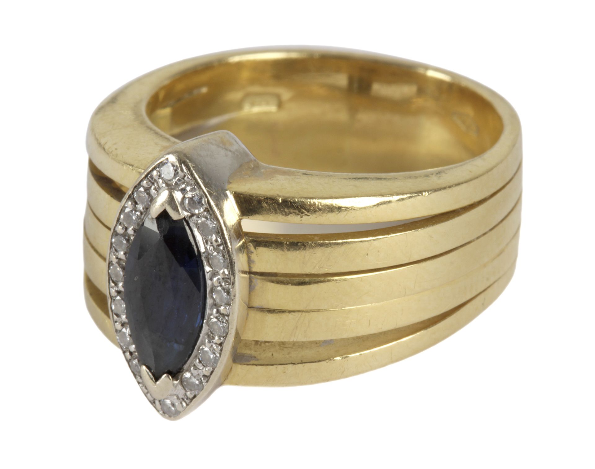 Sapphire and diamond ring with an 18k. yellow gold setting