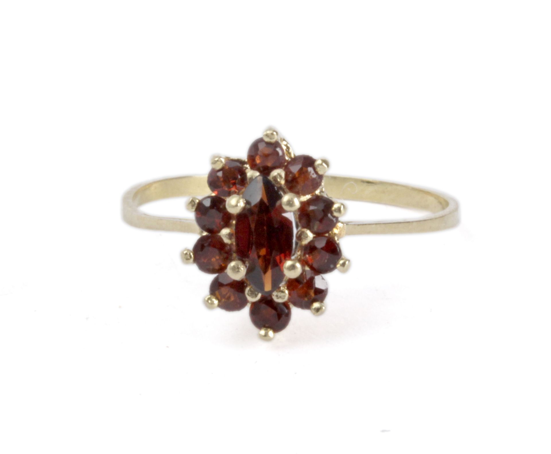 Garnet cluster ring with an 18k. yellow gold setting