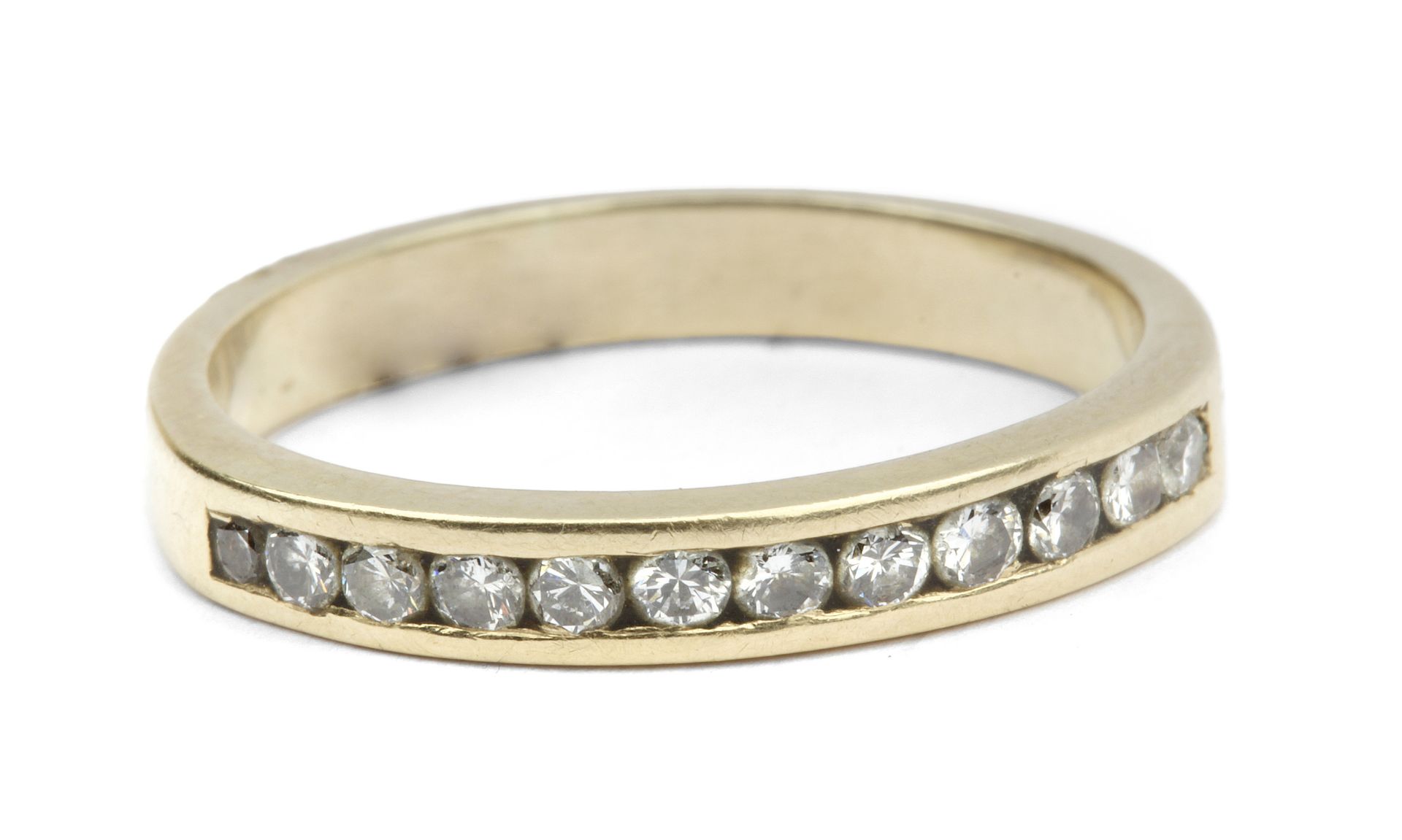 Brilliant cut diamonds half eternity ring with an 18k yellow gold setting