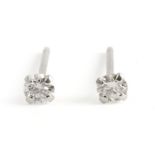 18k. white gold and brilliant cut diamonds stud earrings