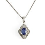 18k. white gold brilliant cut diamonds and oval cut kyanite cluster pendant