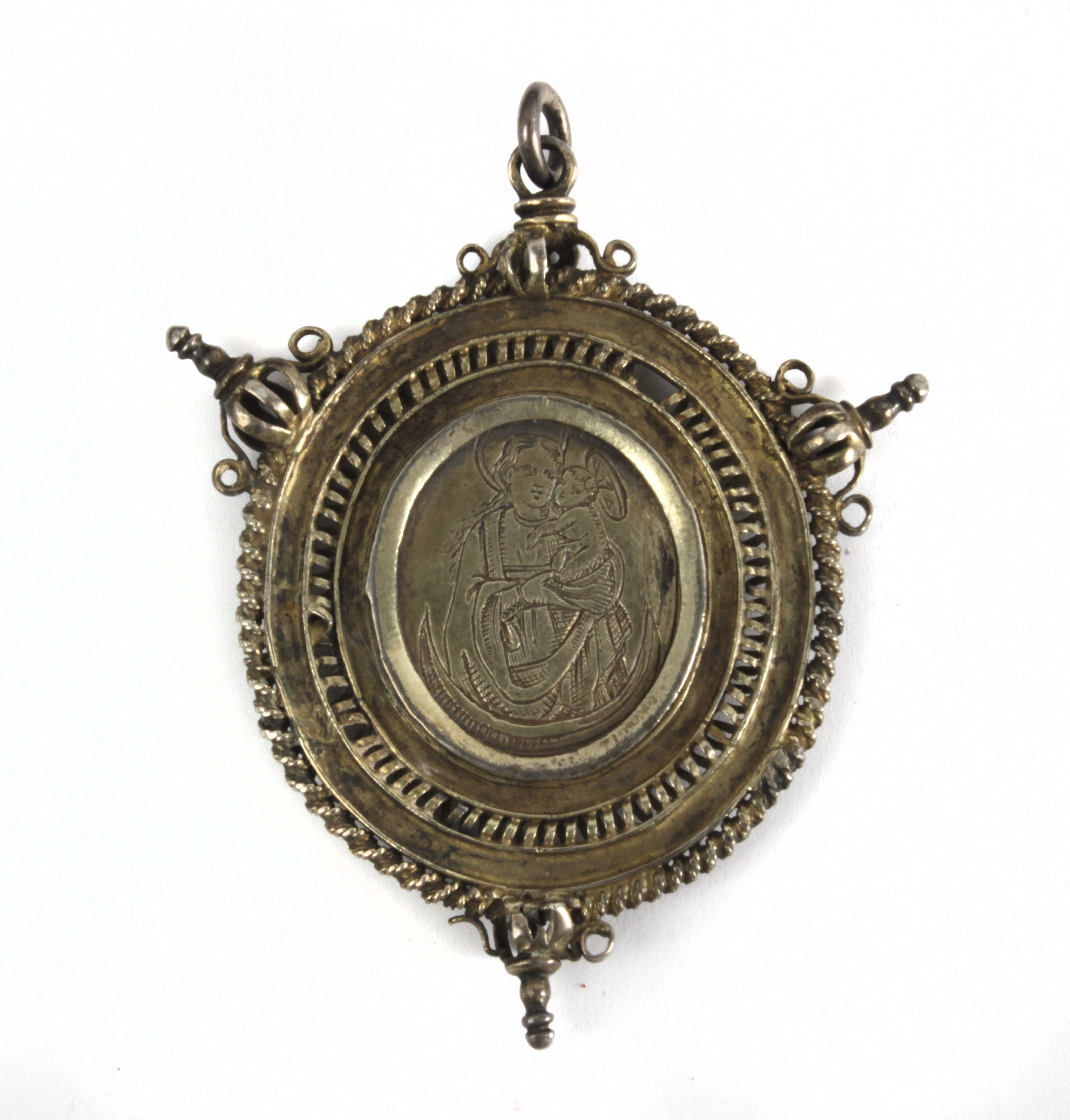 17th century gilt silver paten or devotional medallion probably from Castile and León