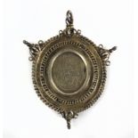 17th century gilt silver paten or devotional medallion probably from Castile and León