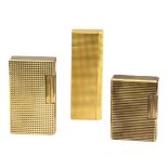 Dupont & Cartier. Collection of six gold plated lighters