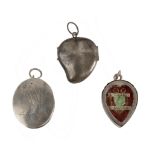 Three late 19th century-early 20th century silver reliquary pendants