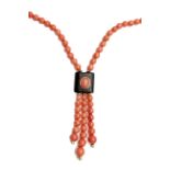 Red coral beads, ebony and 18k yellow gold necklace