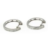 18k. white gold and baguette cut diamonds hoop earrings