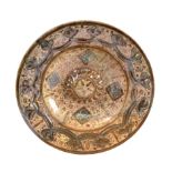 Second quarter of 15th century decorative dish with a raised boss in Manises tin-glazed pottery