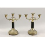 Pair of late 19th century Empire period French three light bronze candlesticks