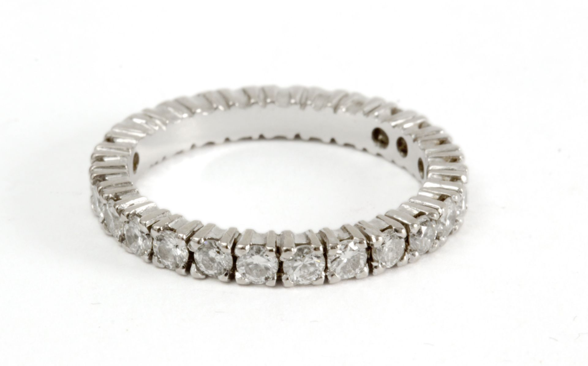 18k. white gold and brilliant cut diamonds eternity band