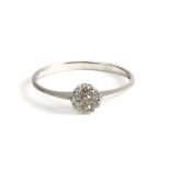 18k. white gold and brilliant cut diamonds cluster ring