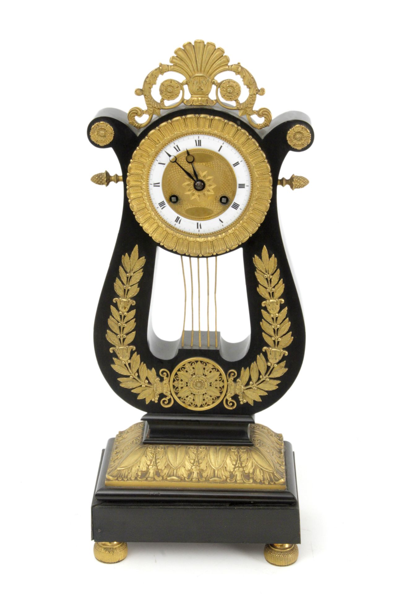 An early 19th century French Restoration portico mantel clock