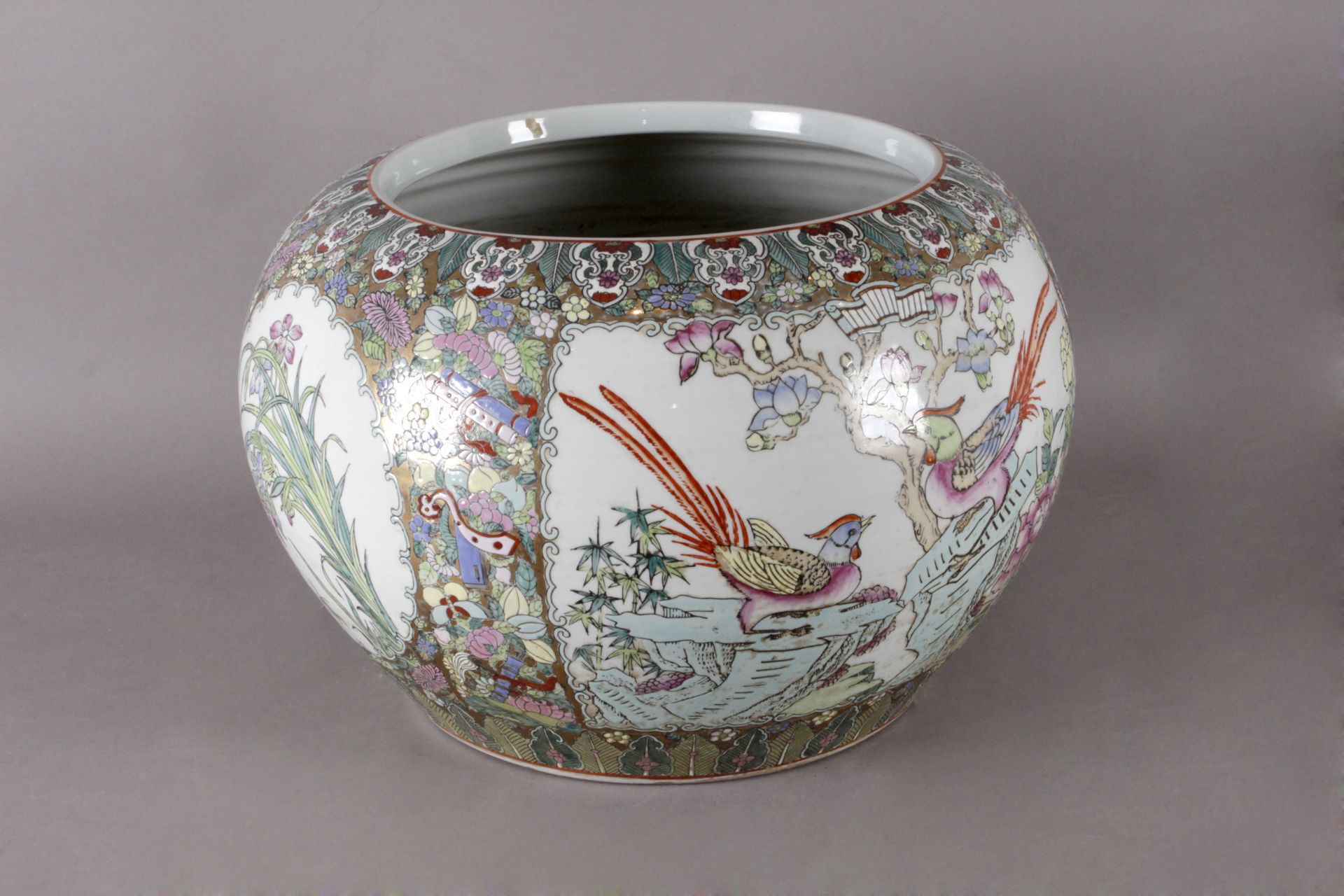 A 20th century Chinese cache pot in Famille Rose porcelain