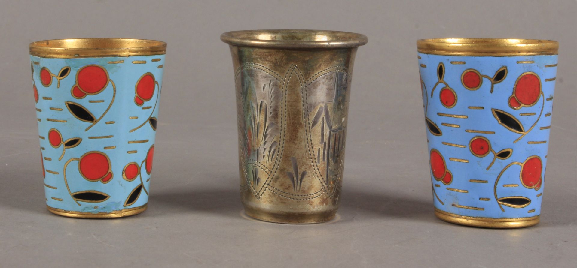 Late 19th century and 20th century set of three silver vodka shot glasses