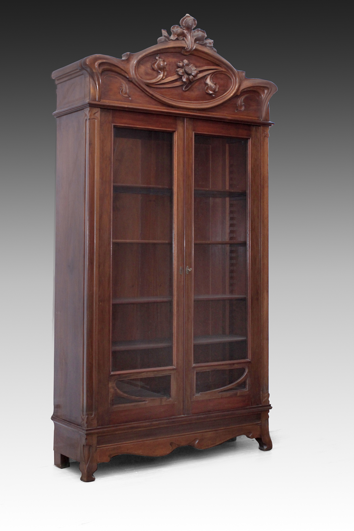 Early 20th century modernist mahogany glass cabinet