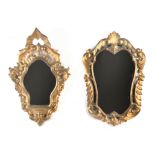 A pair of 20th century Louis XV style cornucopia mirrors