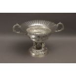 A 20th century Empire style embossed silver centrepiece