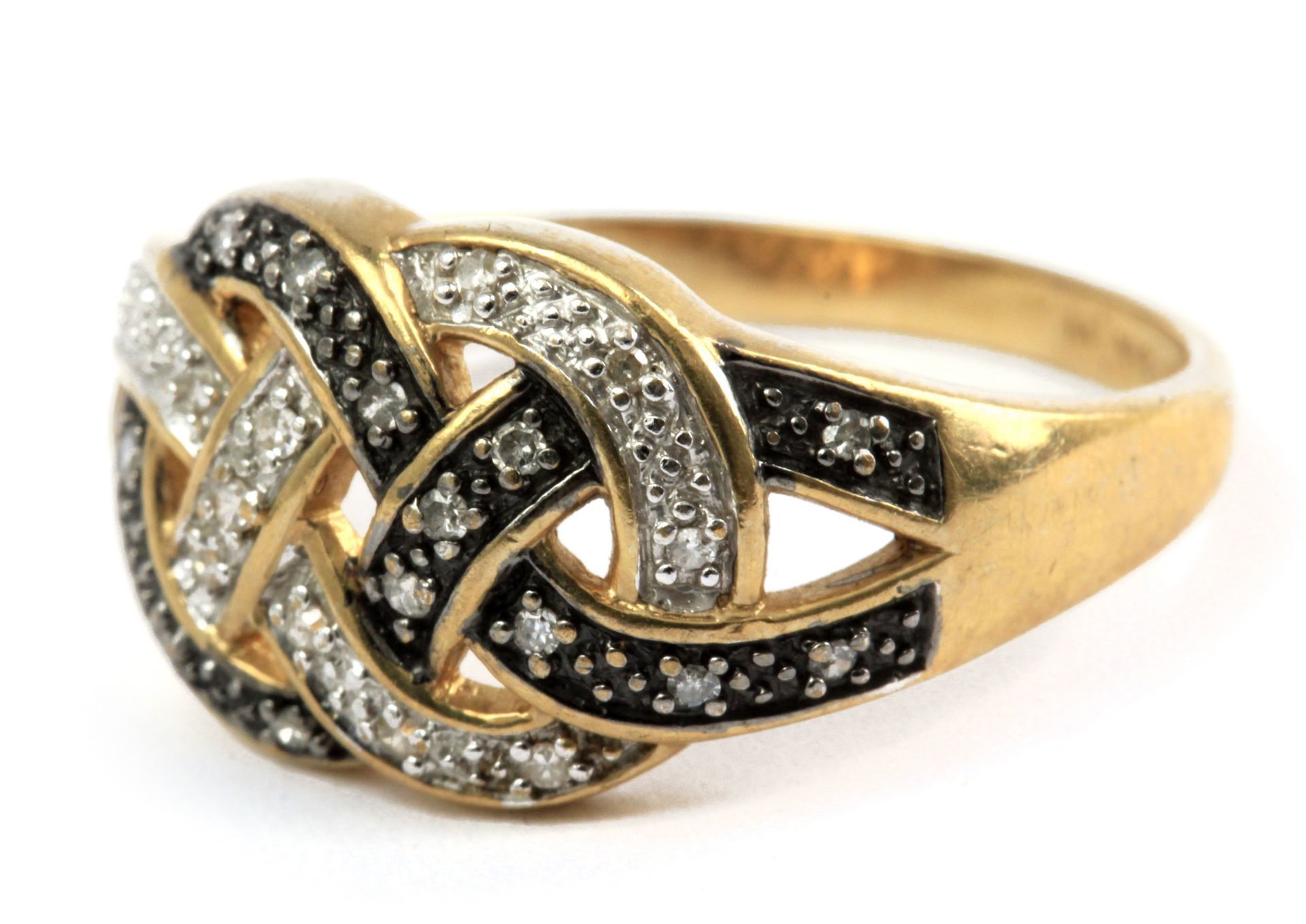 A braided ring with an 18 k. yellow gold and silver setting with single cut diamonds