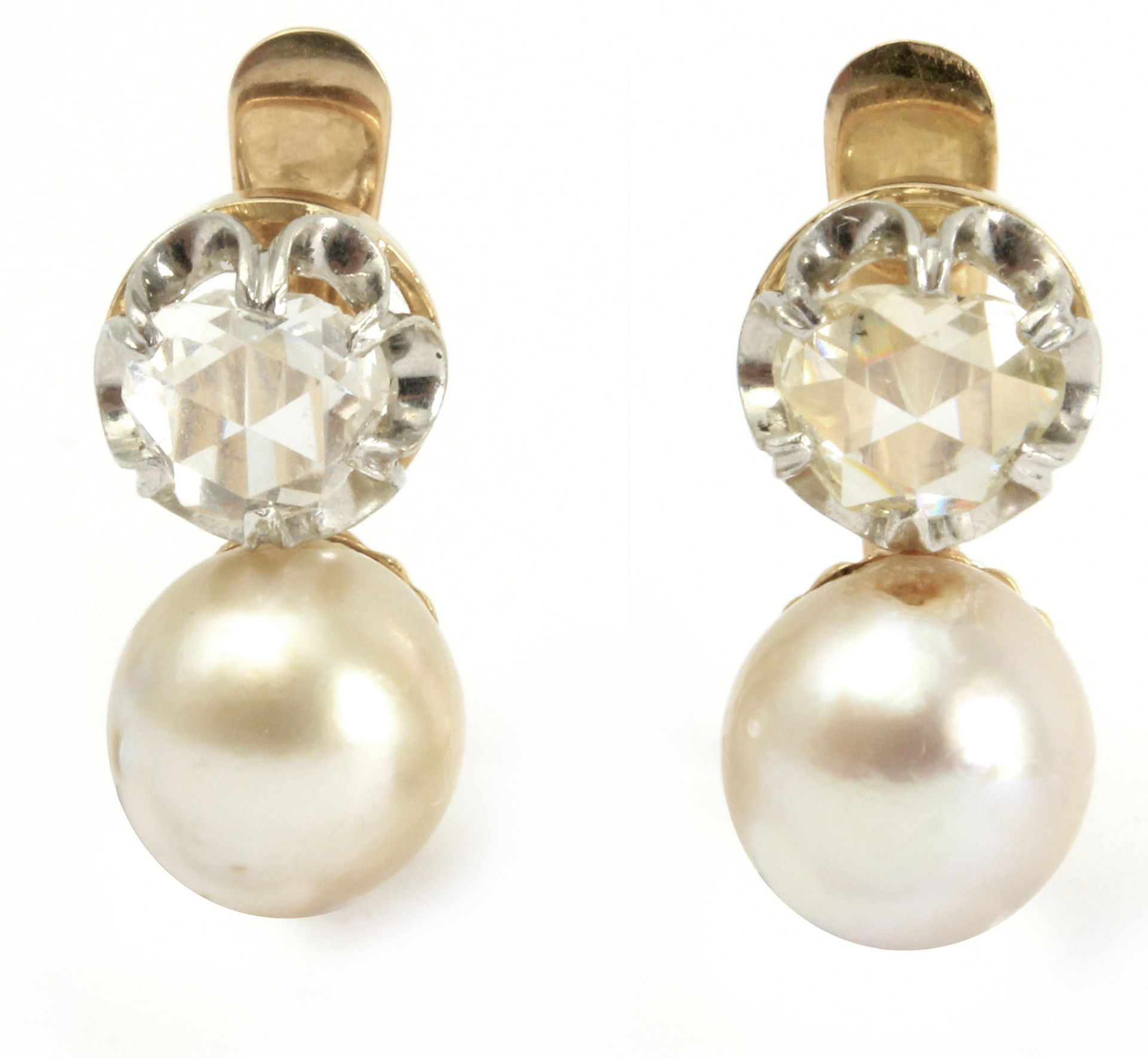 A pair of 'toi et moi' earrings with rose cut diamonds