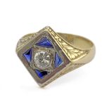 A signet ring with an 18 k. yellow gold and platinum setting and a point cut diamond