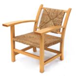 After Josep Torres Clavé. An armchair with an oak structure and knitted string seat and backrest