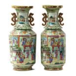 A pair of early 20th century Chinese Famille Rose Canton vases