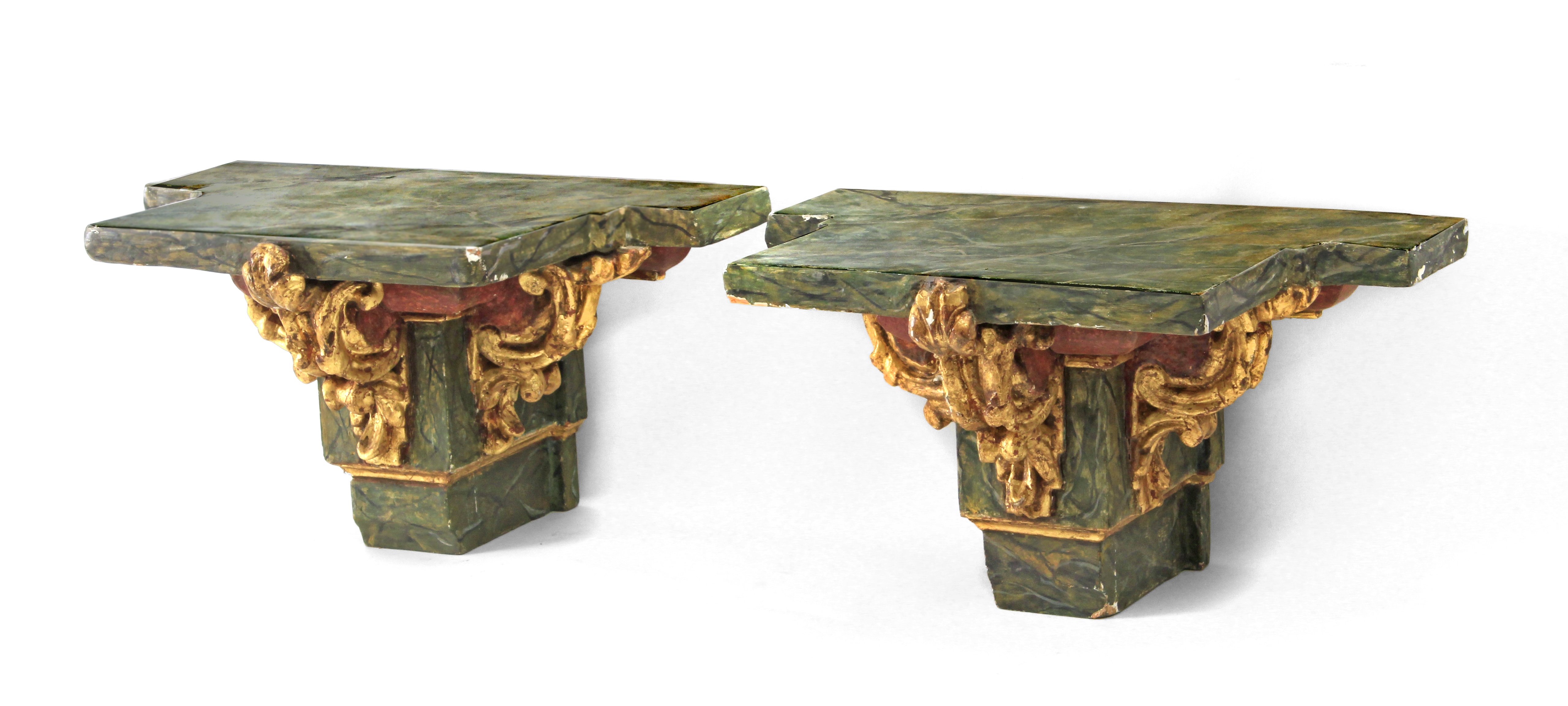 A pair of 20th century carved and polychromed brackets