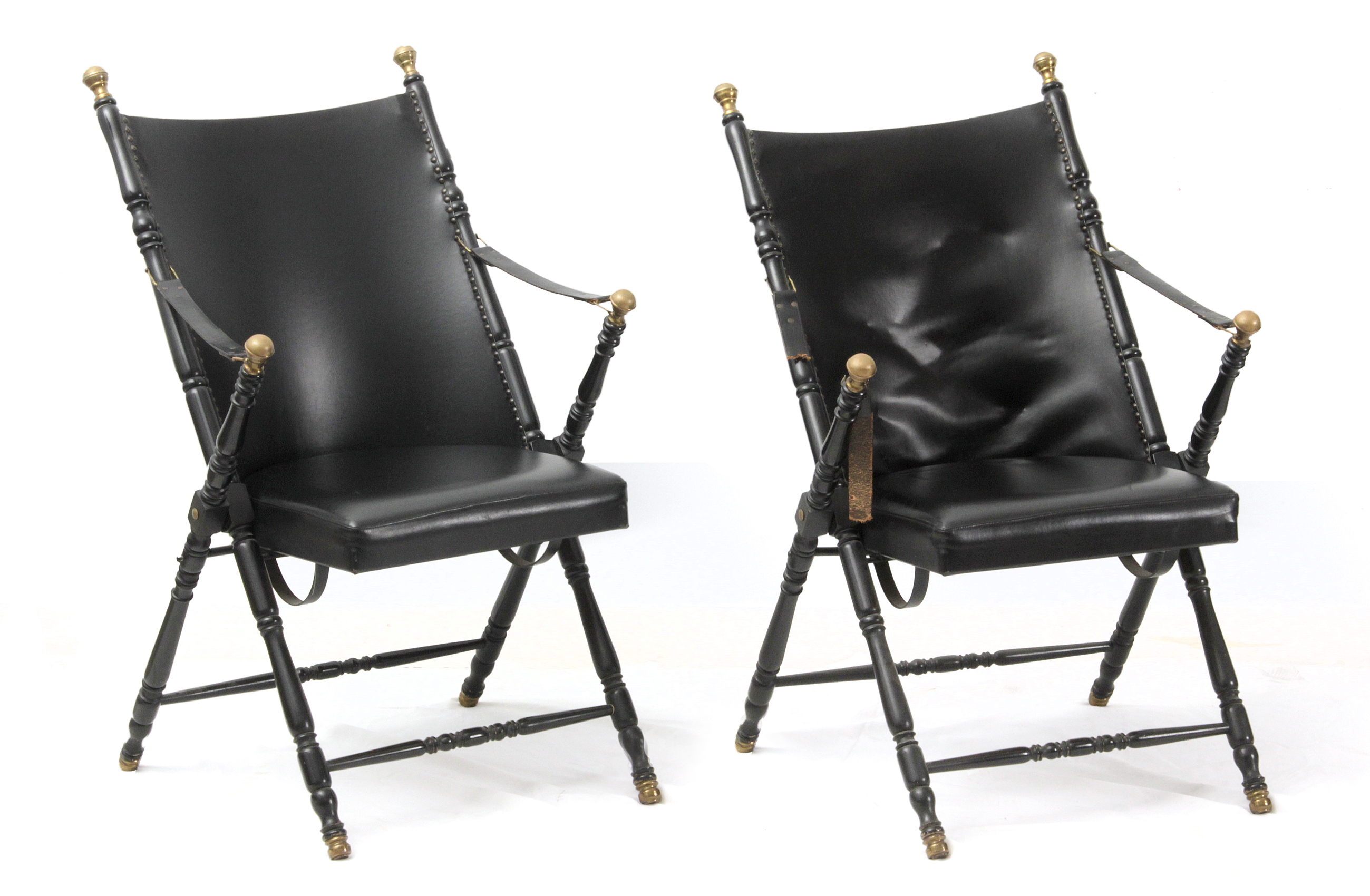 A pair of 20th century armchairs in lacquered wood with leather upholstery