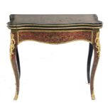 A 19th century Charles III style game table in lacquered wood with Boulle brass inlay marquetry