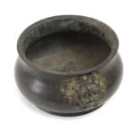 A 20th century bronze cauldron