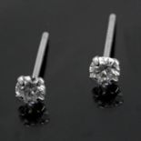 A round brilliant cut diamond stud earrings with an 18k. white gold setting
