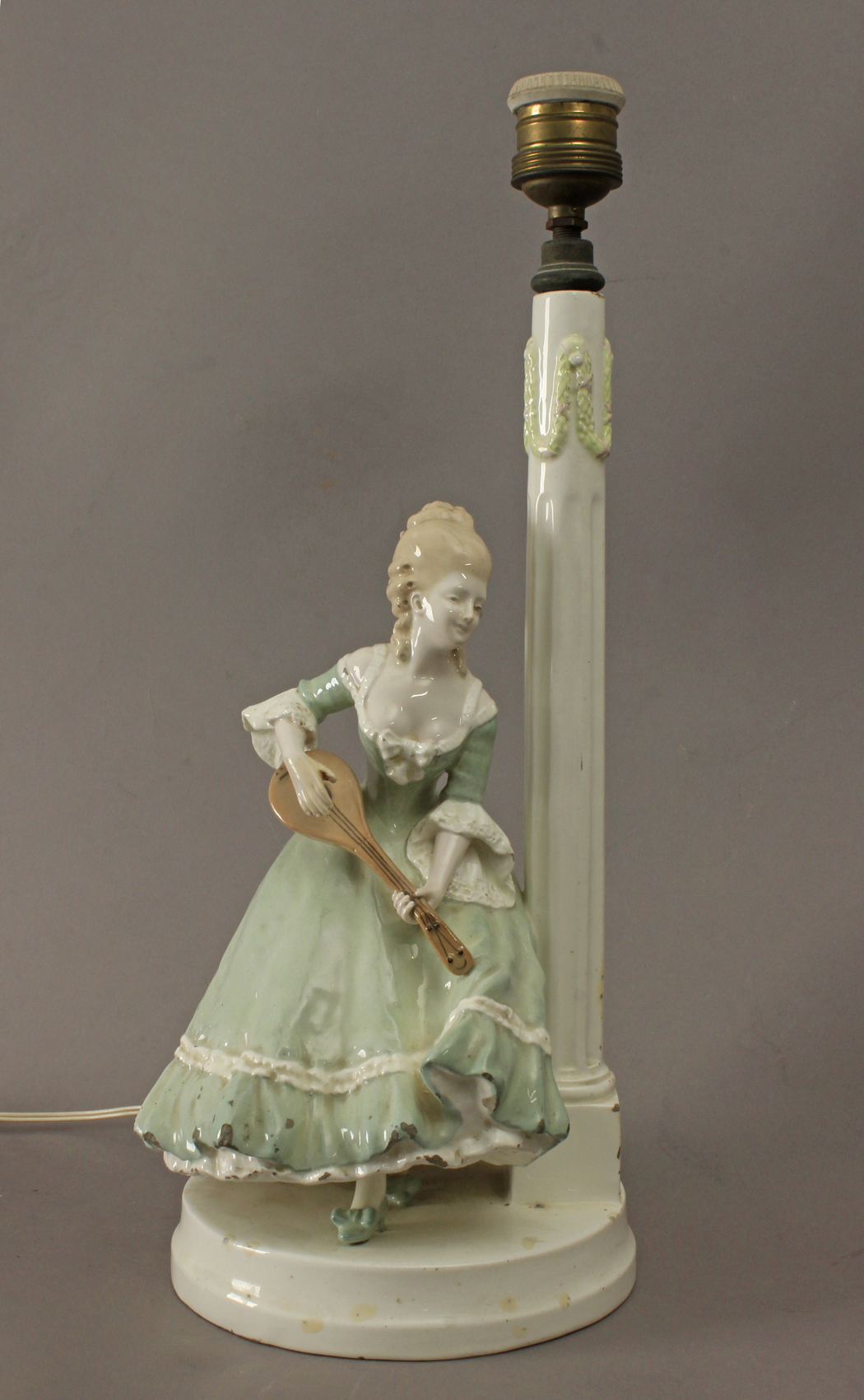 A 20th century Austrian table lamp in Goldscheider porcelain