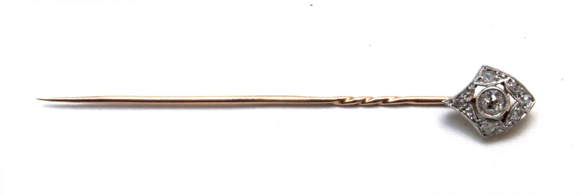 First third of 20th century diamond tie pin with an 18 k. yellow gold and platinum setting