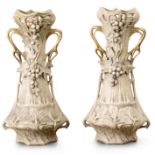 A pair of late 19th century-early 20th century Austrian vases in Royal Dux porcelain