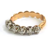 A first half of 20th century half eternity ring