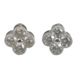 A pair of Alhambra style earrings with an 18 k. white gold setting and round brilliant cut diamonds