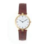 Cartier. A ladies 18 k. yellow gold wrist watch