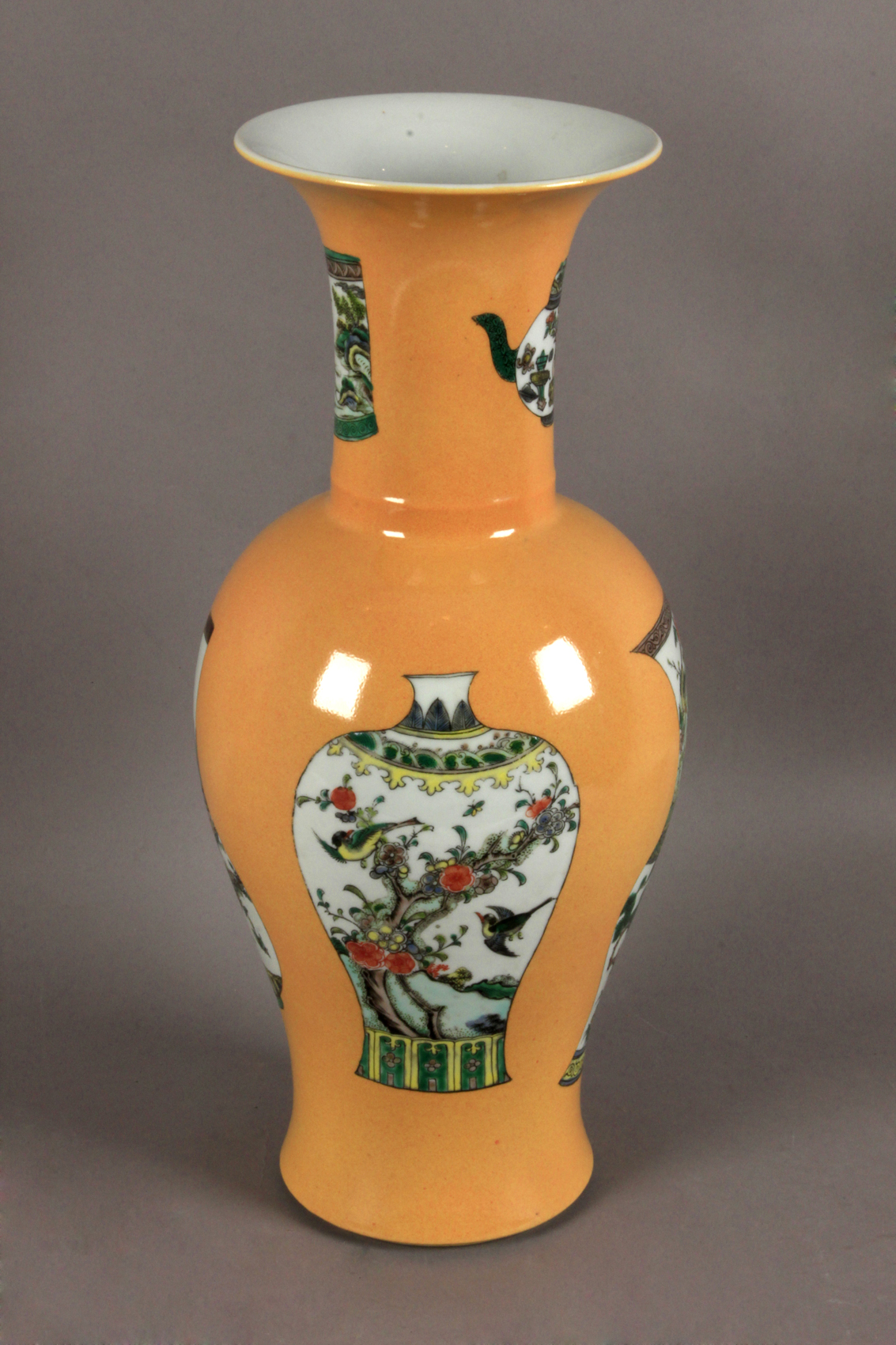 A 20th century Chinese vase in Kangxi style monochrome yellow glazed porcelain