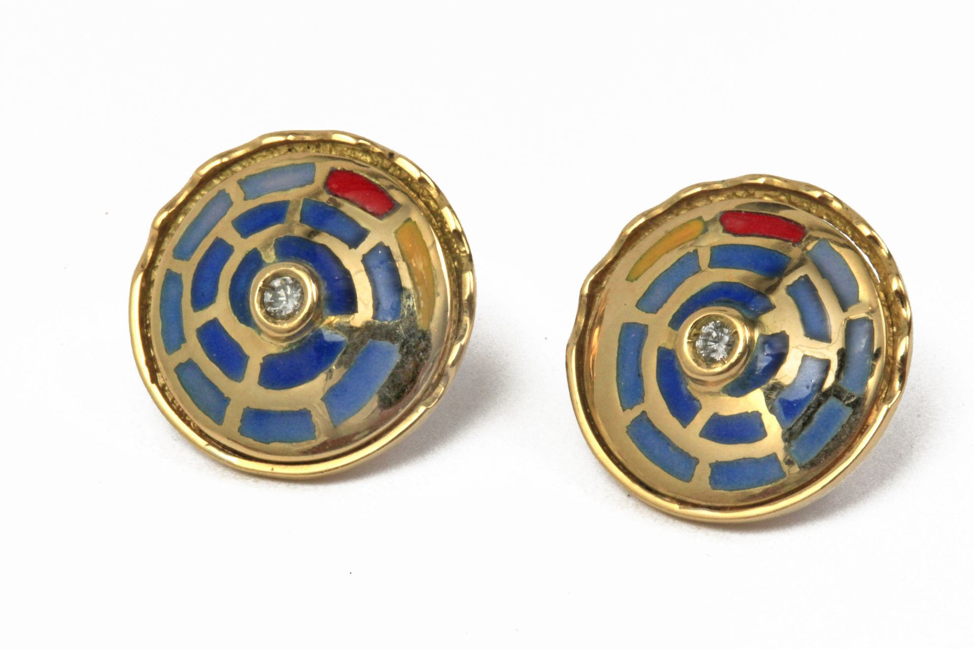 A pair of design earrings with an 18 k. yellow gold setting, brilliant cut diamonds and enamel