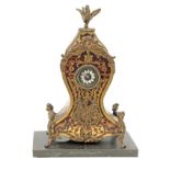A 19th century Louis XV style pocket watch holder designed as a mantel clock