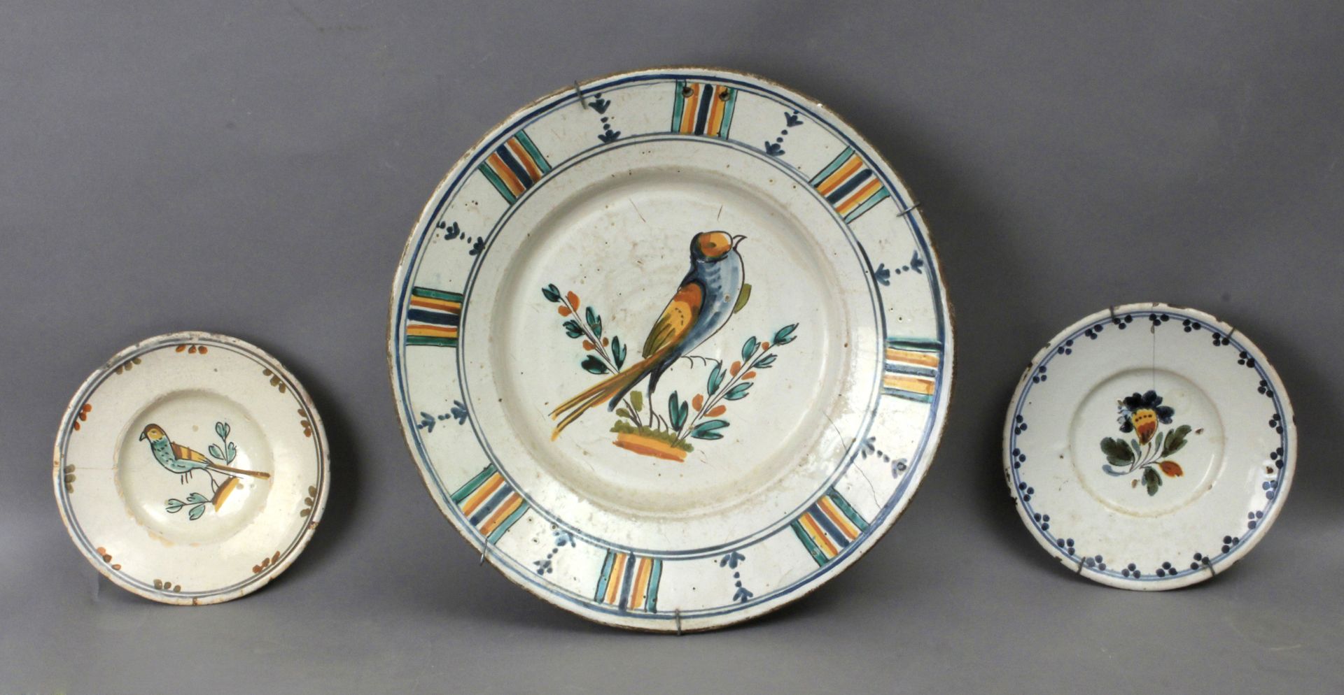 A set of three 19th century Catalan plates in Banyoles pottery