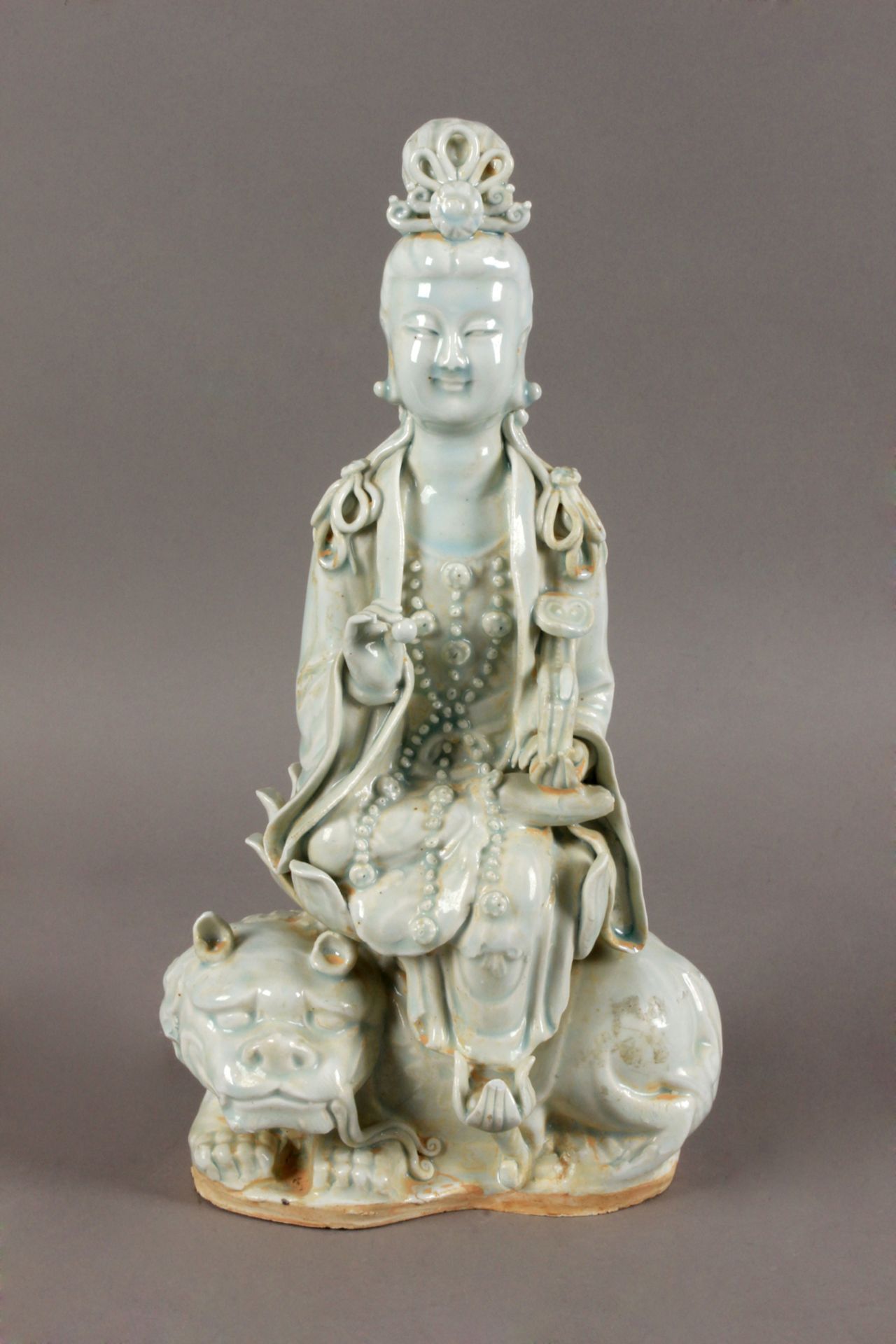 20th century Chinese school. A Guanyin figure in Blanc de Chine porcelain