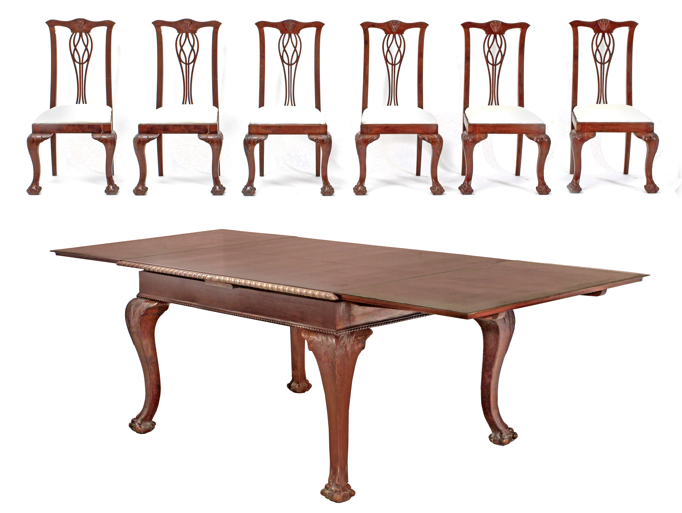 Set of six Chippendale style mahogany chairs and a table circa 1900