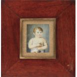 A 19th century Spanish portrait miniature of a child
