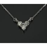 A diamonds heart shaped pendant with an 18 k. white gold setting