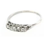 An early 20th century five stone ring with a platinum setting and French cut diamonds