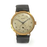 Tissot. A wrist watch circa 1950 in 18 k. yellow gold